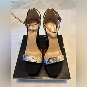 Rouge snakeskin heels